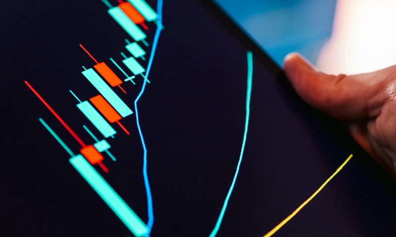 Rising market chart on a tablet